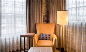 Spread out with extra seating areas in our guest rooms